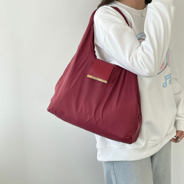 fe65357b-79d2-4be1-873a-2d25ce412dca.jpg Women's Handbag With Key-ring Design Lightweight Shoulder Bag